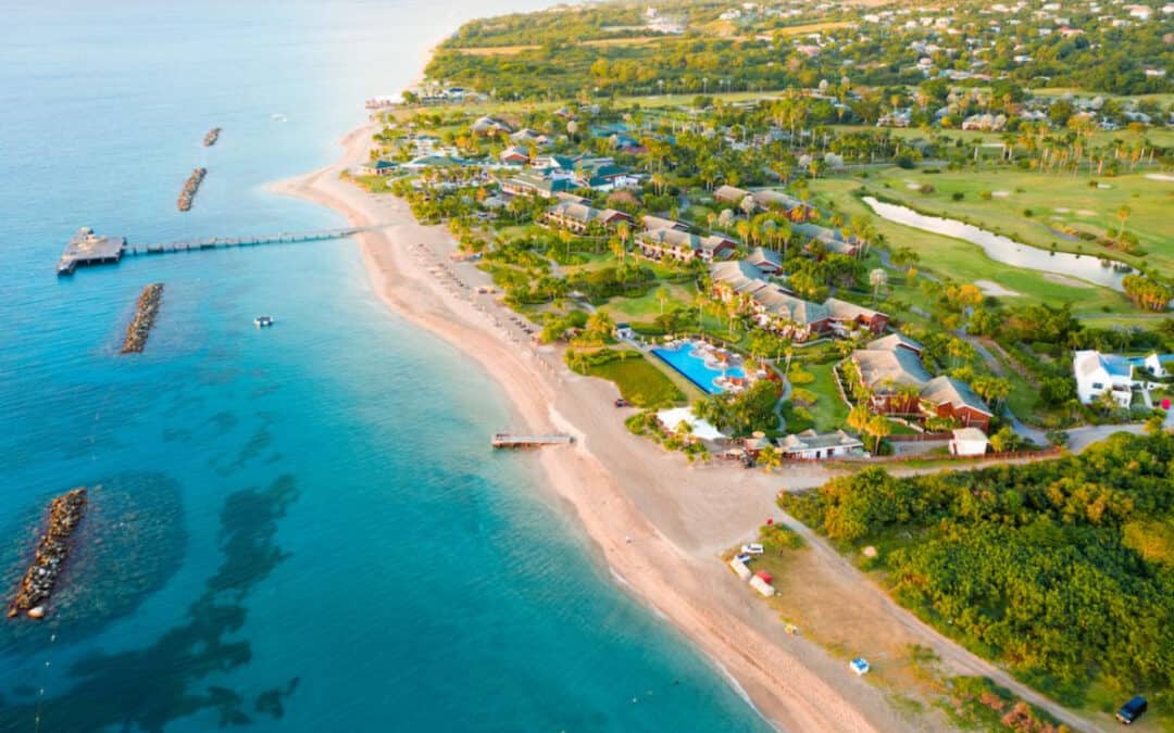 Four Seasons Resort Nevis Drone View with golden sands and clear blue sea.
