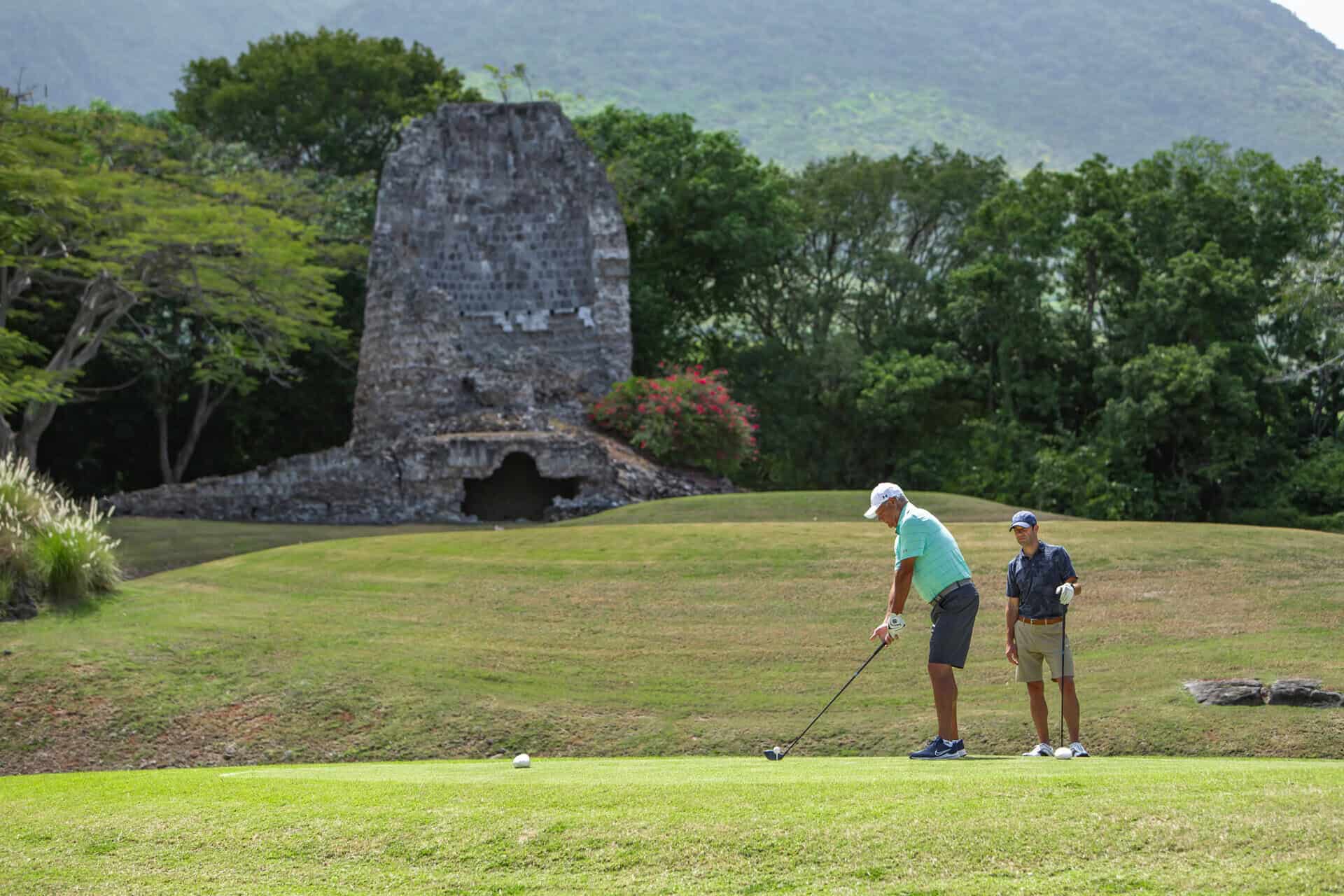 two men playing golf