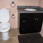 bathroom with toilet and sink