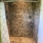 beautiful stone work in shower