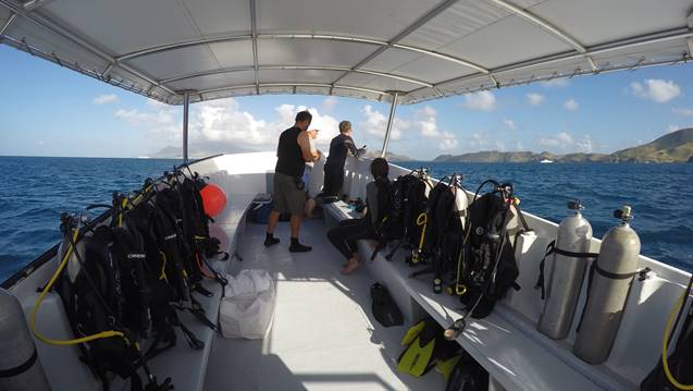 divers on a boat